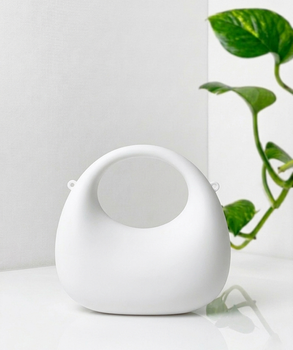 The Oval Orbit – Sculptural Hard-Shell Clutch