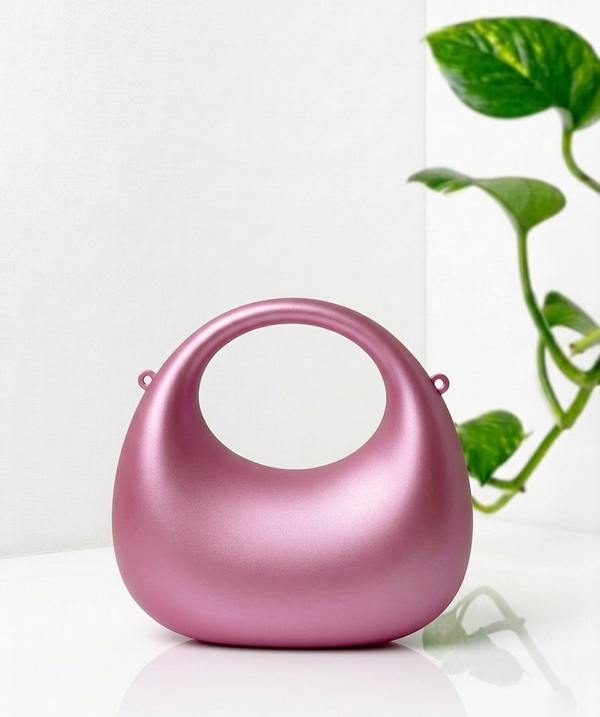 The Oval Orbit – Sculptural Hard-Shell Clutch